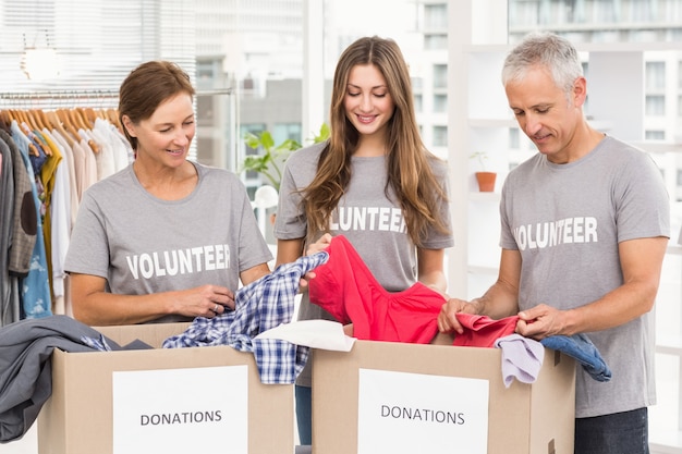 Photo concerned business people with donation boxes