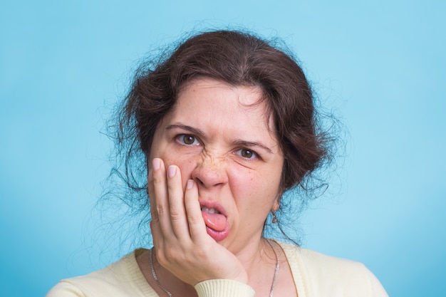 Concerned scared woman   in studio