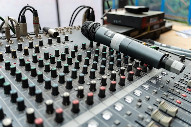 the concert microphone is on the mixing console The concept of sound recording