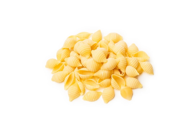 Conchiglie pasta isolated on a white background with copy space