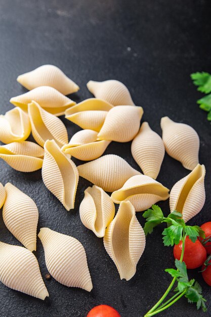 Conchiglioni raw pasta royal seashells ready to cook ingredient healthy meal food snack