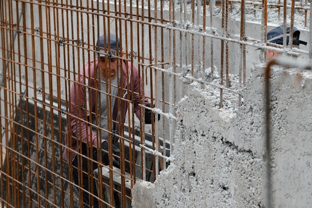 Concreate wall made with reinforcement on construction site metal rods