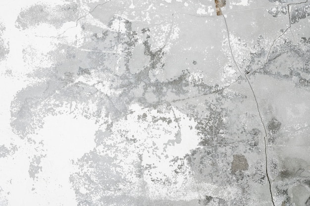 Concrete achtergrond. Witte schilferige pleister op ongeverfde betonnen muur
