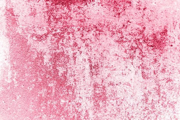 Concrete achtergrondstructuur van oude vuile roze betonnen stenen muur als achtergrond grunge grijs cement oppervlak zoals structuurpapier materiaal close-up afgezwakt in viva magenta trendkleur van het jaar 2023