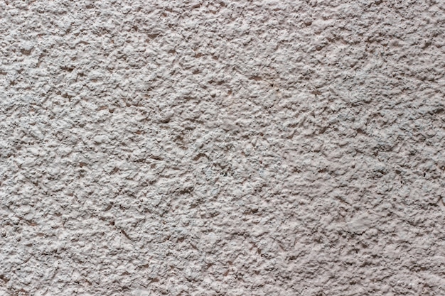 Concrete background painted with white paint.