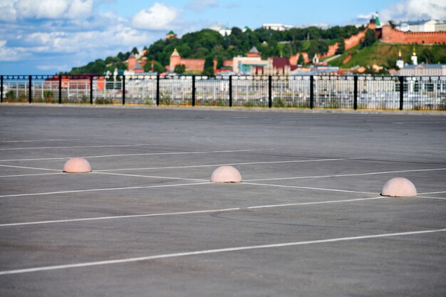 Concrete hemispheres parking limiter. Protection from car parking. Elements to restrict access to parking zone and control movement of vehicles