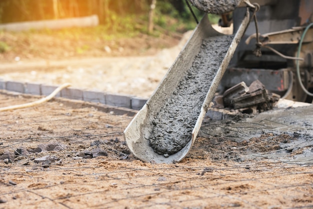 Concrete pouring during commercial concreting floors of building