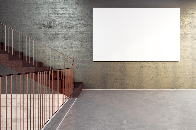 Фото Бетонные лестницы в офисном здании с пустым баннером на стене