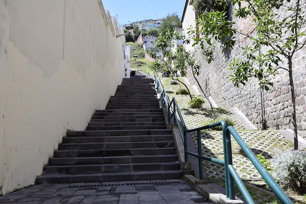 Concrete stairs on typical colonial street in historic district Quito