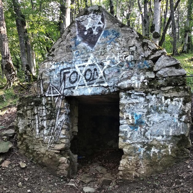 A concrete structure with graffiti on the slope of Mount Beshtau. Pyatigorsk, Russia.