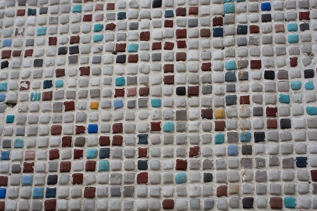 Concrete wall covered with mosaic background