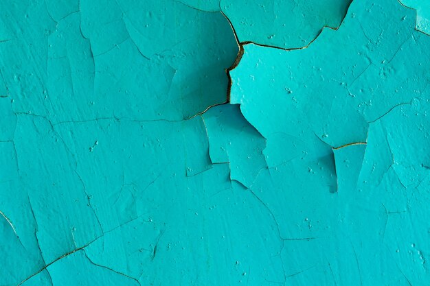 Concrete wall with blue paint in the cracks. background for design. grunge texture. High quality photo