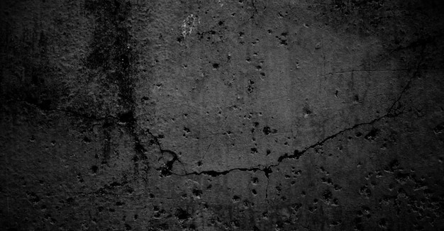 A concrete wall with a rough texture.