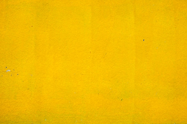 Concrete wall yellow color for texture background