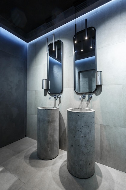 Concrete washbasin in a loft style interior