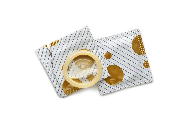 Condoms isolated on white background A condom use to reduce the probability of pregnancy or sexually transmitted disease