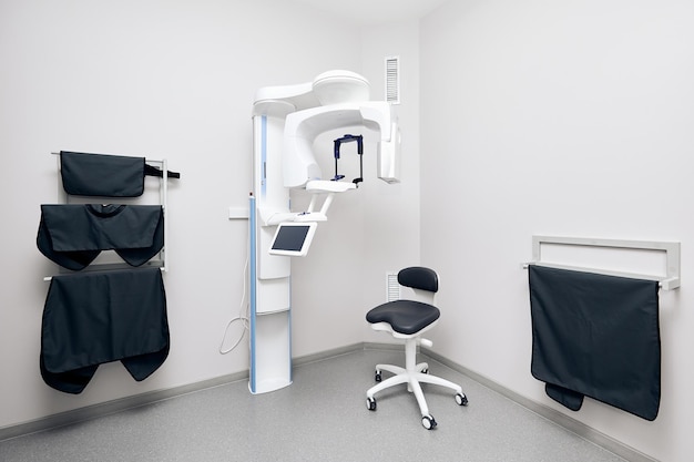 Photo cone beam computer tomography and protective cape in clinic