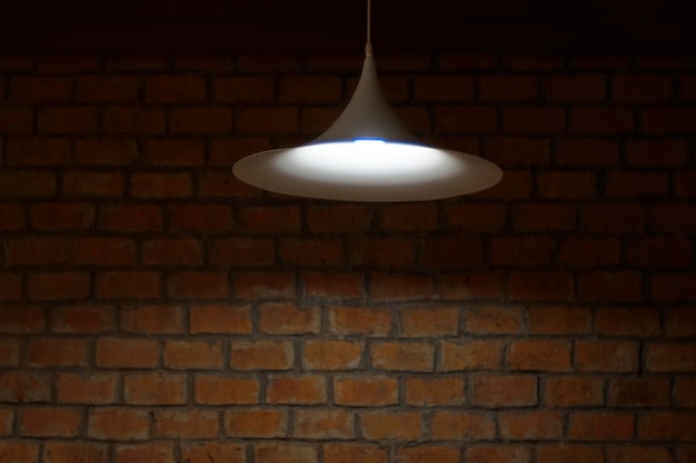 A cone light probe with brick tile wall in background