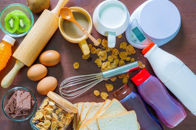 Confectionery and cake equipmentBowls of ingredients needed for baking colorful cupcakes