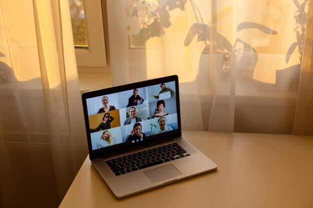 Conference room with video conference equipment and laptop