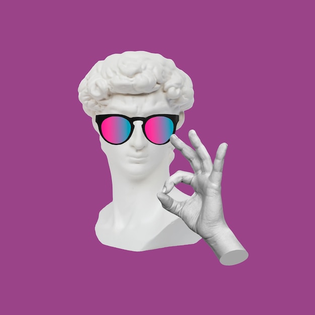 Photo confident antique male david statue's head in sunglasses shows the ok gesture with hand