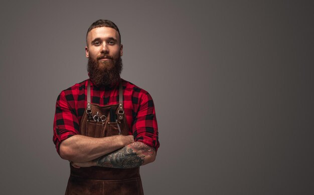 Confident barber looking at camera