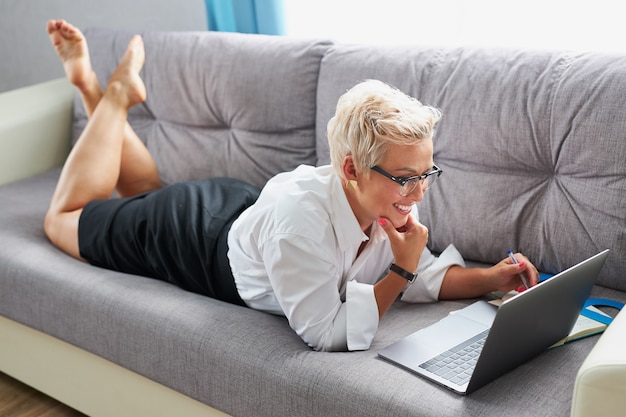 Confident business lady wearing eyeglasses