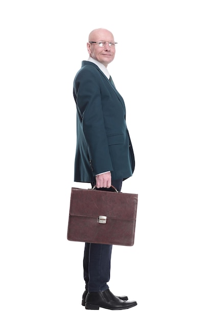 Confident business man with a briefcase looking at you