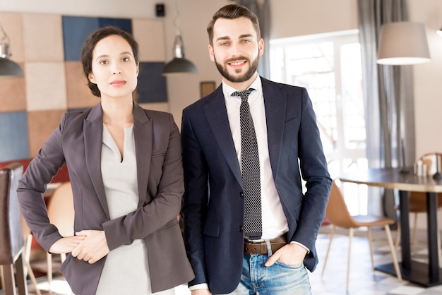 Confident business team in hall