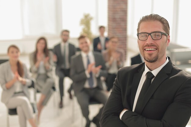 Confident businessman on the background of the conference roombusiness background