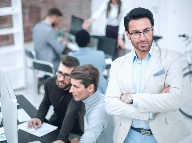 Confident businessman on the background of the office