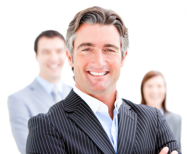 Confident businessman looking at the camera with his colleague 