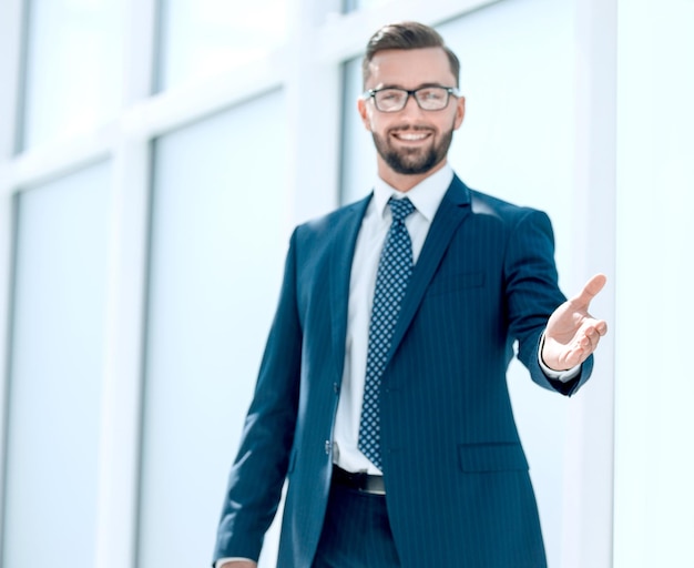 Confident businessman pointing at you
