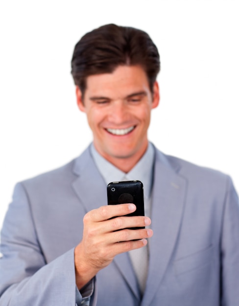 Confident businessman using a mobile phone 