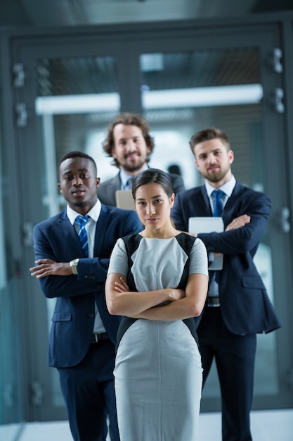 Confident businesspeople standing in office