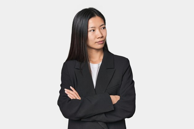 Confident Chinese businesswoman posing