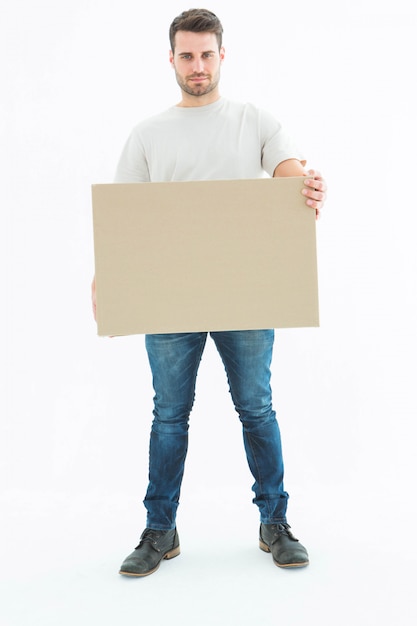 Photo confident delivery man carrying cardboard box