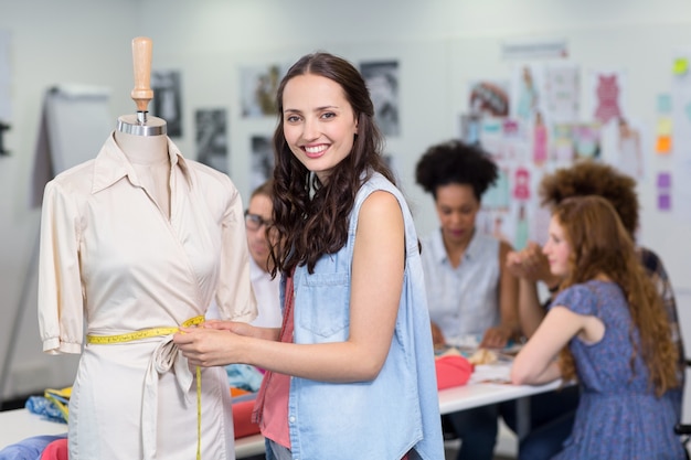 Confident female fashion designer