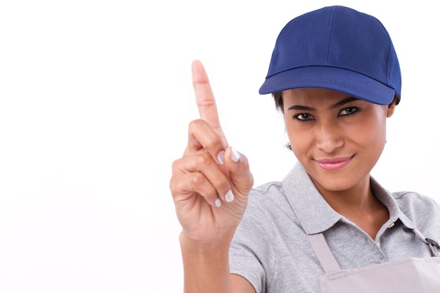 Confident female worker showing one finger gesture