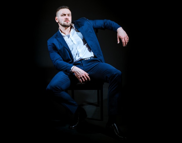 Confident handsome business man in suit Fashion male model Portrait of a handsome guy in shirt