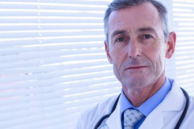 Confident male doctor looking at camera 