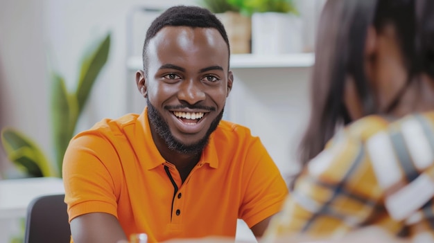 Confident man engaging in lively conversation at a collaborative workspace