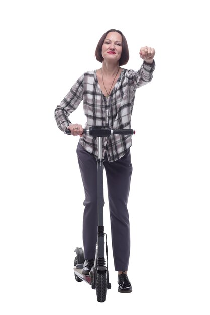 Confident mature woman with electric scooter showing thumbs up