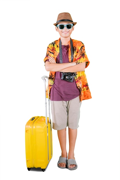 Confident preteen boy wear summer clothes on studio