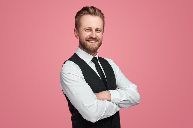 Confident smiling businessman in studio