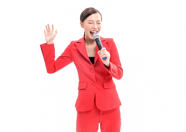 Confident stylish lady in red dress posing