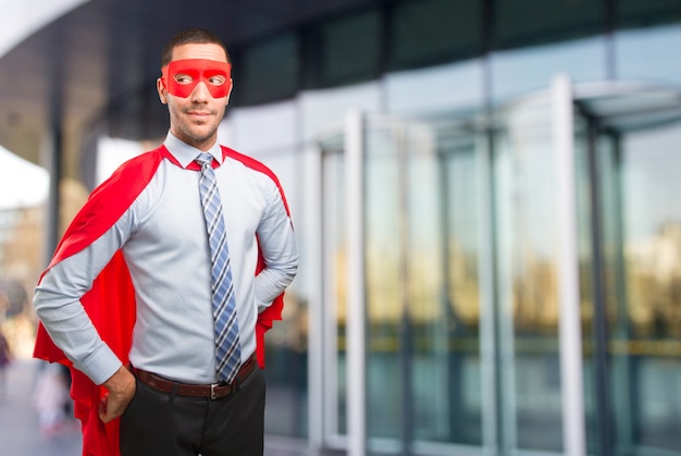 Confident super businessman looking