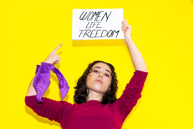Photo confident woman holding women life freedom sign
