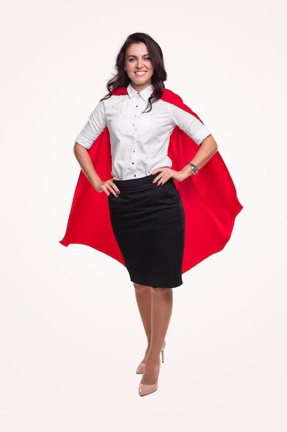 Confident woman in superhero cape