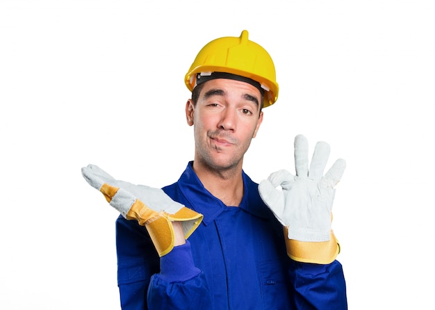 Confident worker with show gesture on white background